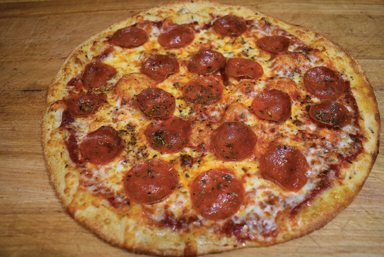 Pie Guys Pizza Back to Normal with Extraordinary Pizza Forsyth Woman